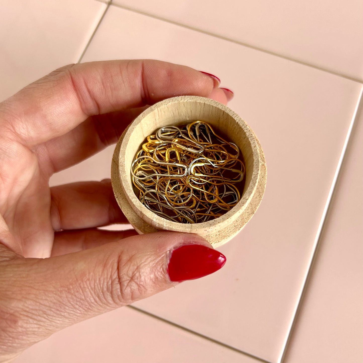 wooden box of metal stitch markers in gold and silver, set of approximately 50 stitch markers