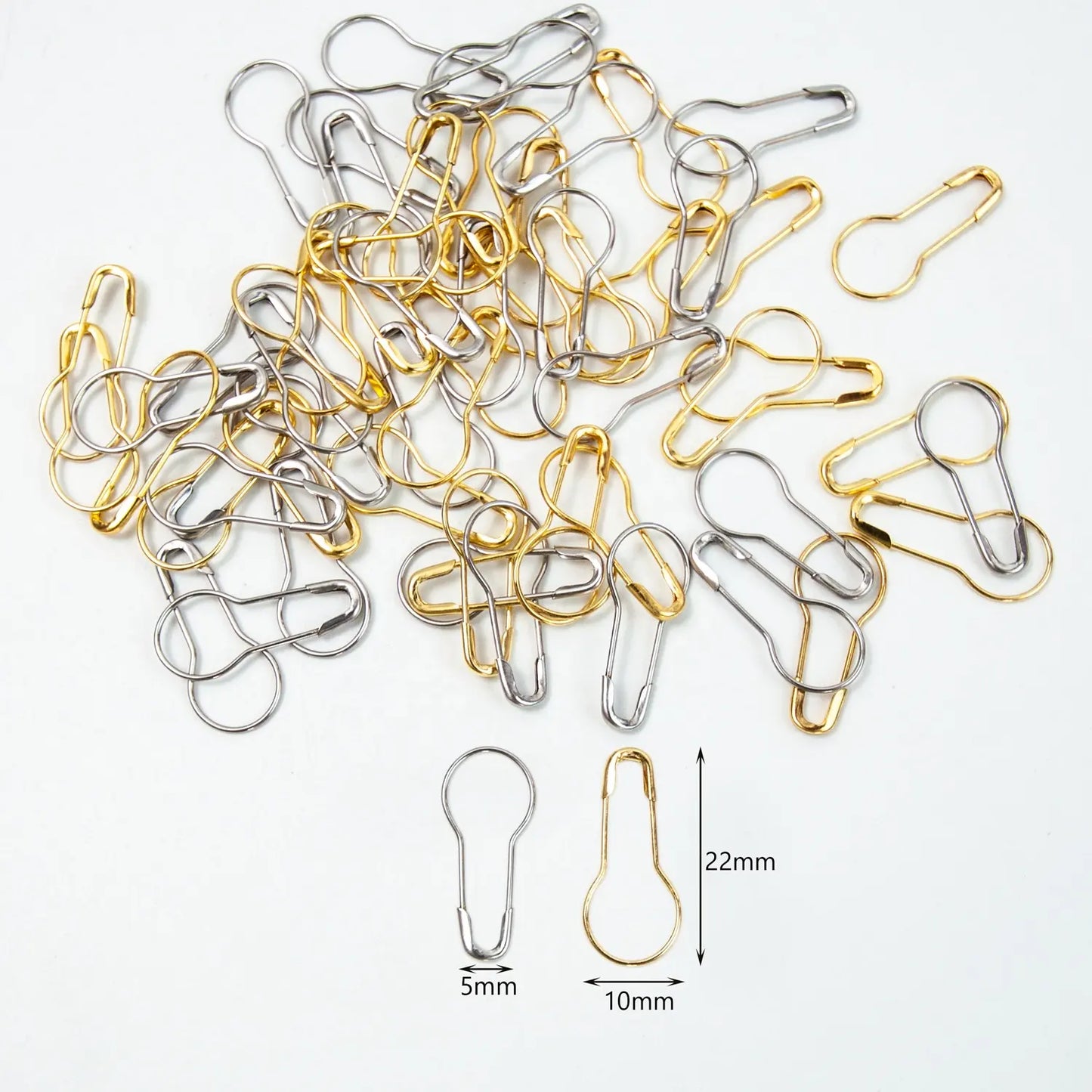 wooden box of metal stitch markers in gold and silver, set of approximately 50 stitch markers