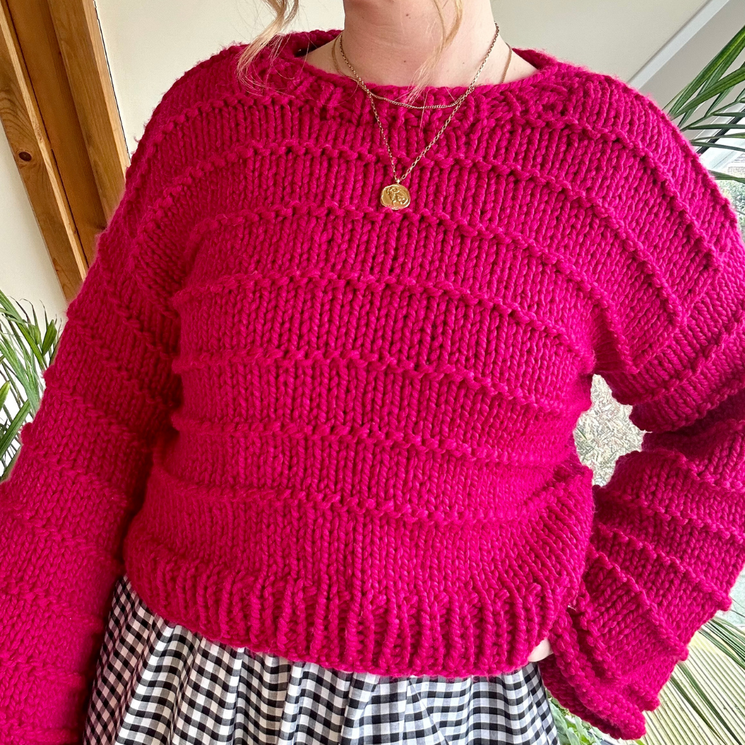 Chunky jumper knitting kit - the Ella Jumper - girl wearing a pink chunky jumper